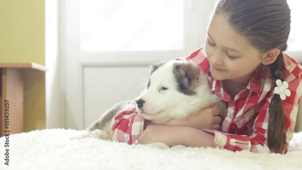 Pretty girl hugging a puppy Shepherd Pretty girl hugging a puppy Shepherd