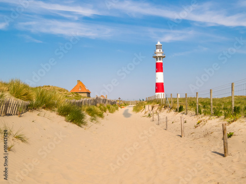 Lighthouse on the coast of the North Sea in a sunny day, Belgium