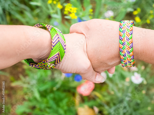 Closeup couple holding hands photo