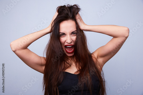 woman screaming and holding his head