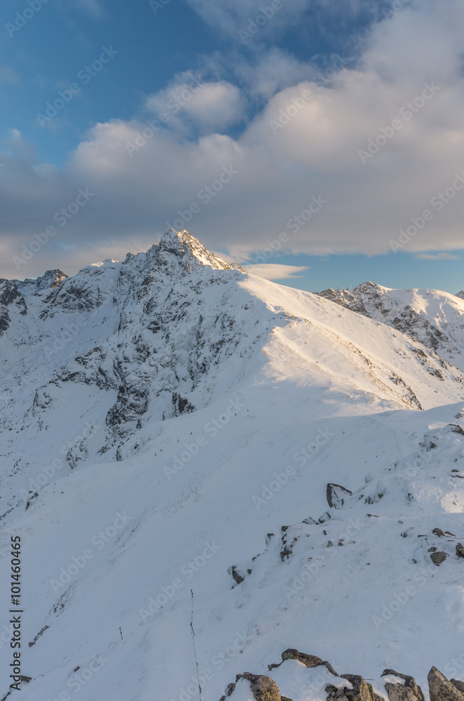 Swinica peak in High Tatras at winter, illuminated by afternoon sun