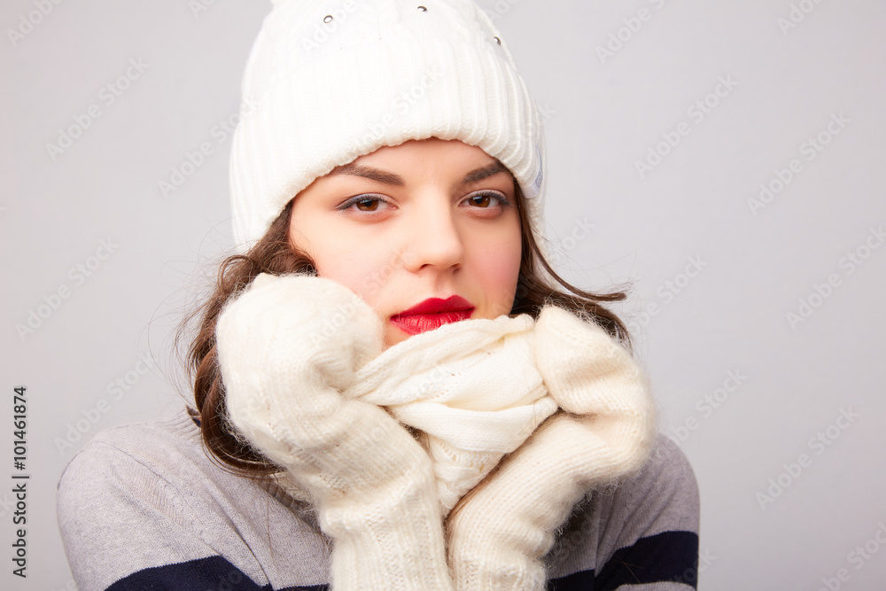 girl in white hat and scarf is frozen girl in white hat and scarf is frozen