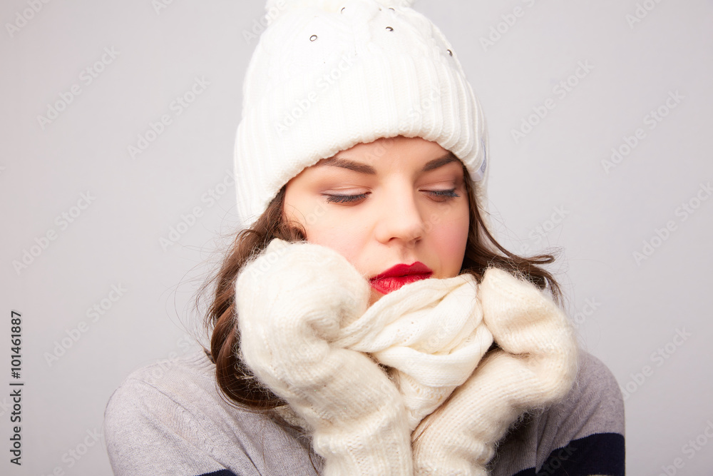 girl in white hat and scarf is frozen girl in white hat and scarf is frozen