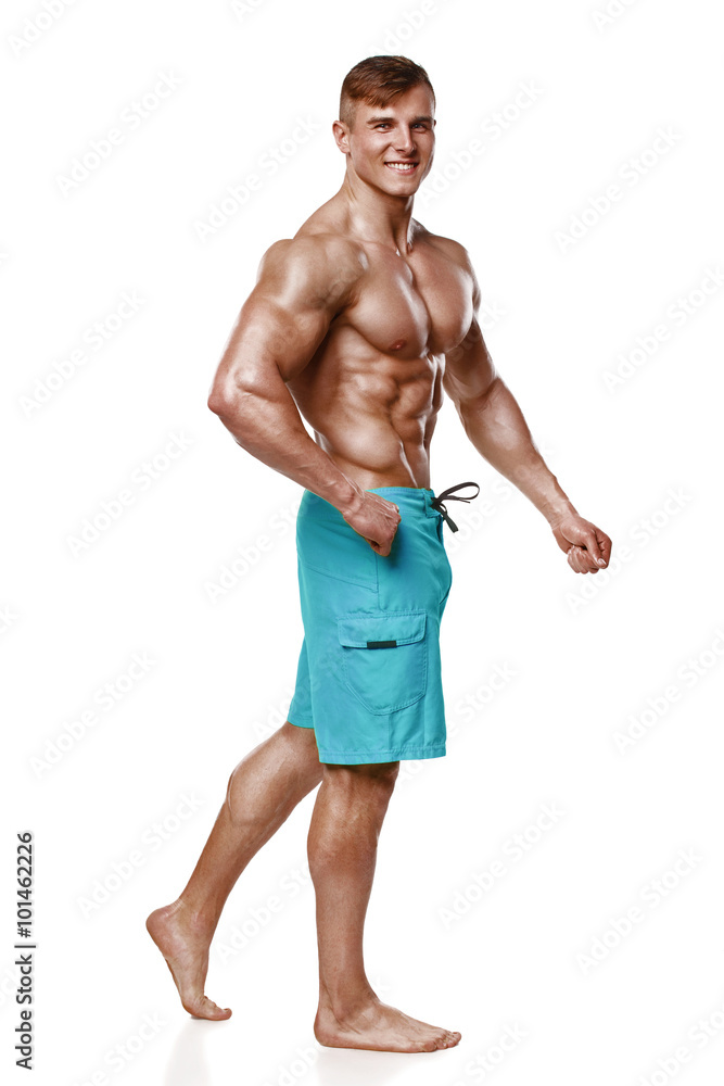 Sexy athletic man showing muscular body, isolated over white background. Strong male nacked torso abs