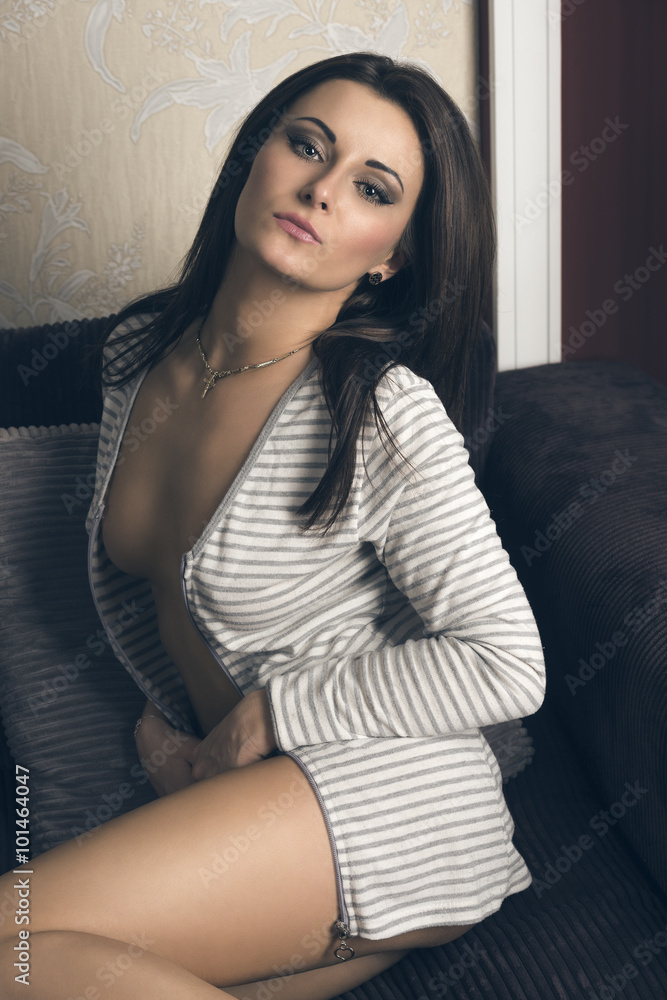 Fototapeta premium alluring woman on sofa