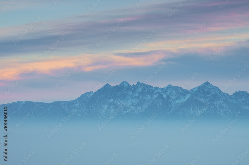 Tatra Mountains from Gorc in Beskidy mountains, winter evening