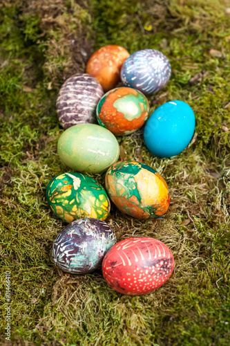 Colorful Easter eggs on the moss
