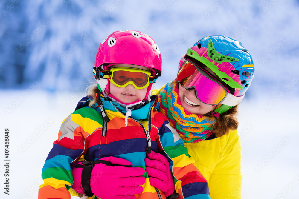 Mother and little girl learning to ski Mother and little girl learning to ski