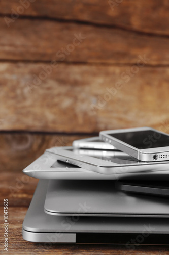 Gadgets on wooden background