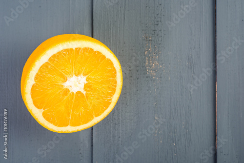 Fresh Orange Slice On Wood Table