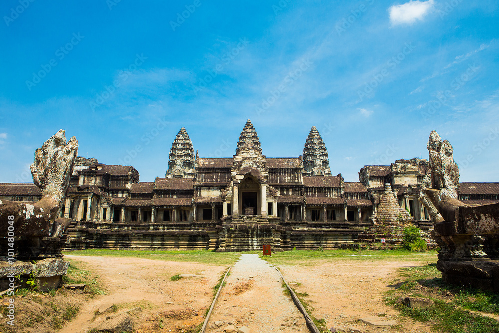 Fototapeta premium Entry in Angkor Wat in Cambodia against blue sky