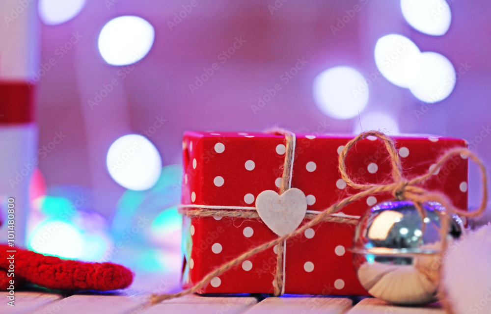 Christmas gift boxes and bubble on blurred wall background