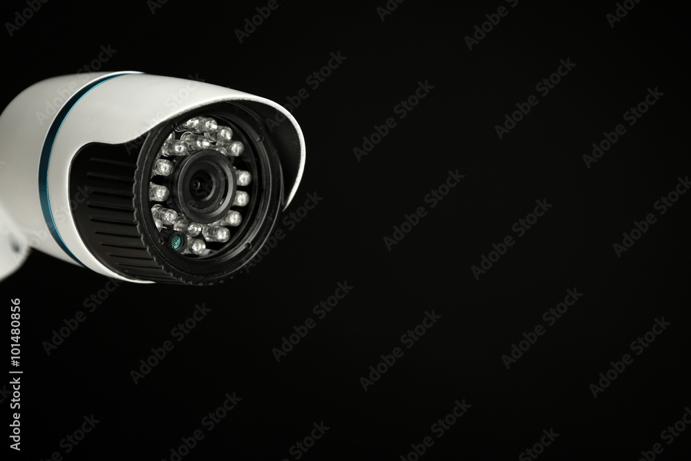 Security CCTV camera on black background, closeup Security CCTV camera on black background, closeup