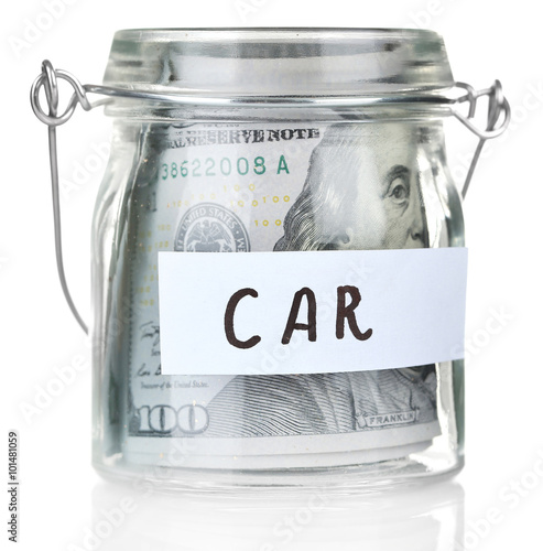 Glass jar with dollar banknotes for car, isolated on white