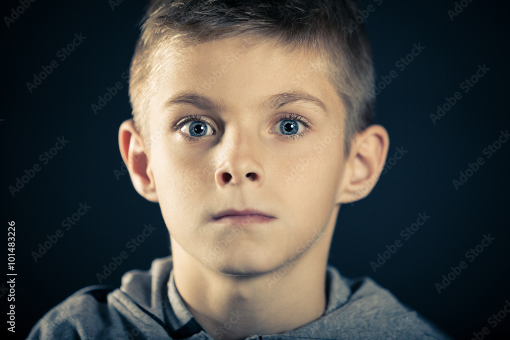 Boy With Wide Open Eyes Staring at the Camera Boy With Wide Open Eyes Staring at the Camera
