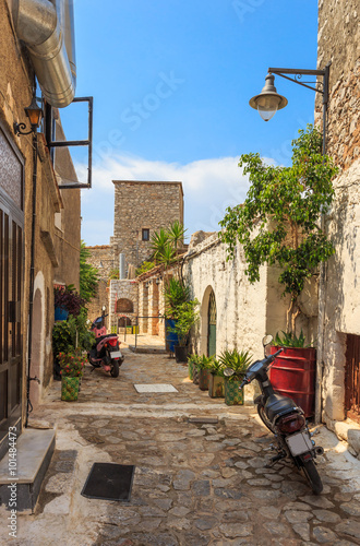 traditional paved street in Areopolis town, Greece, Europe