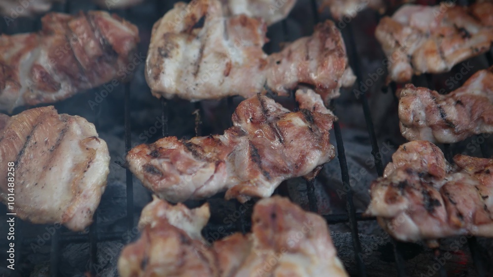 Chicken grilling on barbeque Chicken grilling on barbeque