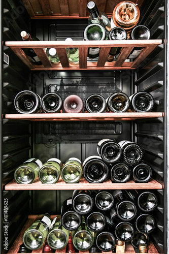 close up shot of a wine cellar. bottles of wine on the shelves