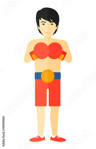 Confident boxer in gloves.