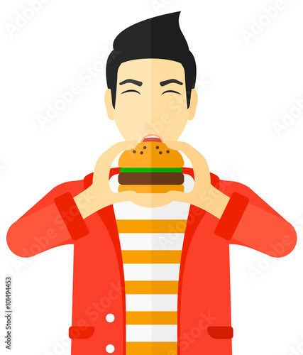 Man eating hamburger. 