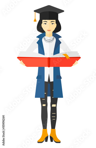 Woman in graduation cap holding book.