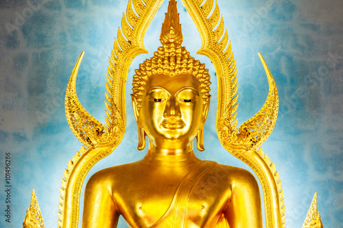 Golden Buddha statue in the Marble Temple or Wat Benchamabophit temple, Bangkok Thailand photo