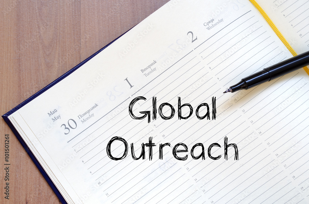 Global outreach write on notebook Global outreach write on notebook
