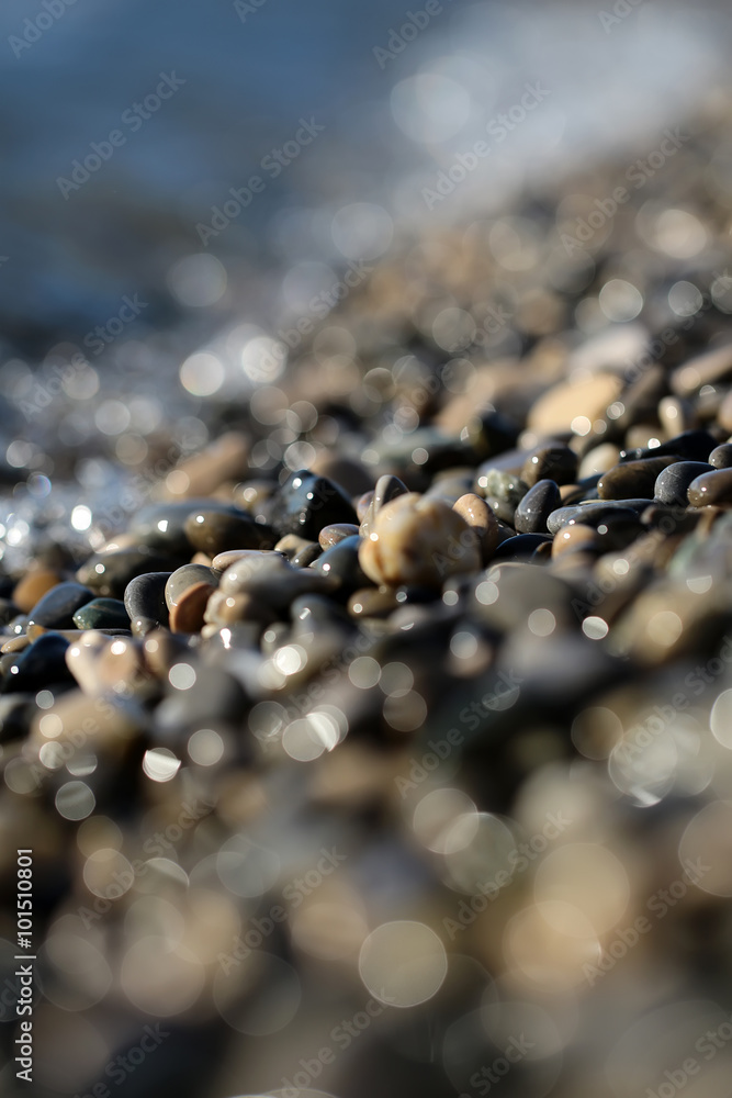 Large quantities of wet pebbles Large quantities of wet pebbles