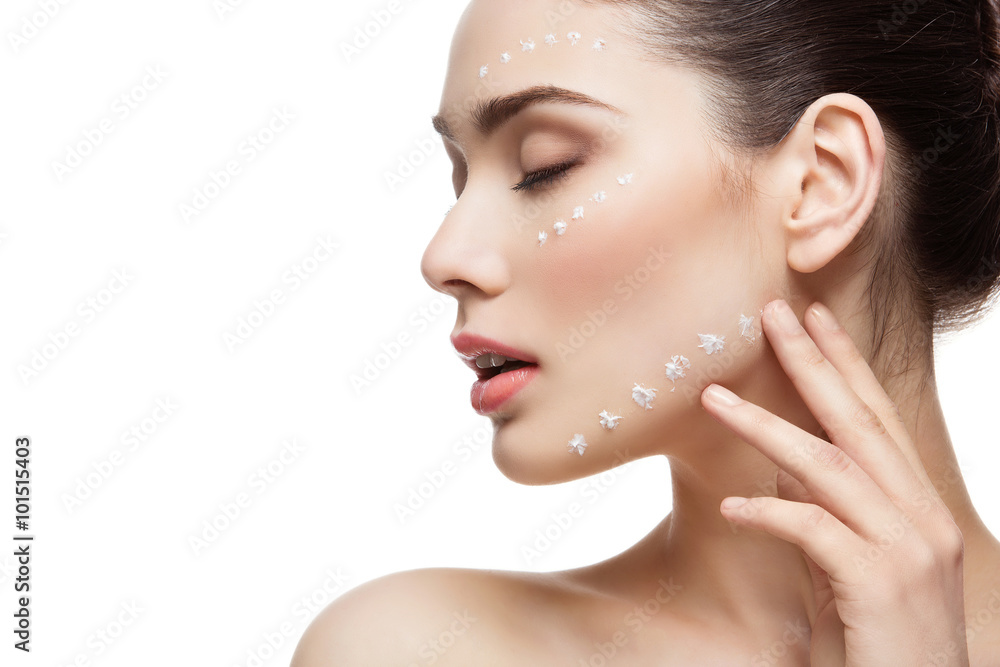 Girl with cream dots on face Girl with cream dots on face