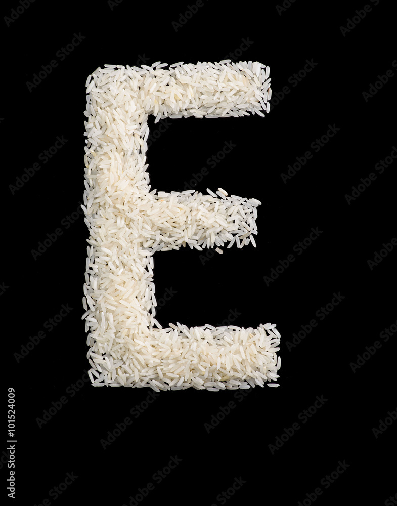 White rice grain alphabet letter e White rice grain alphabet letter e