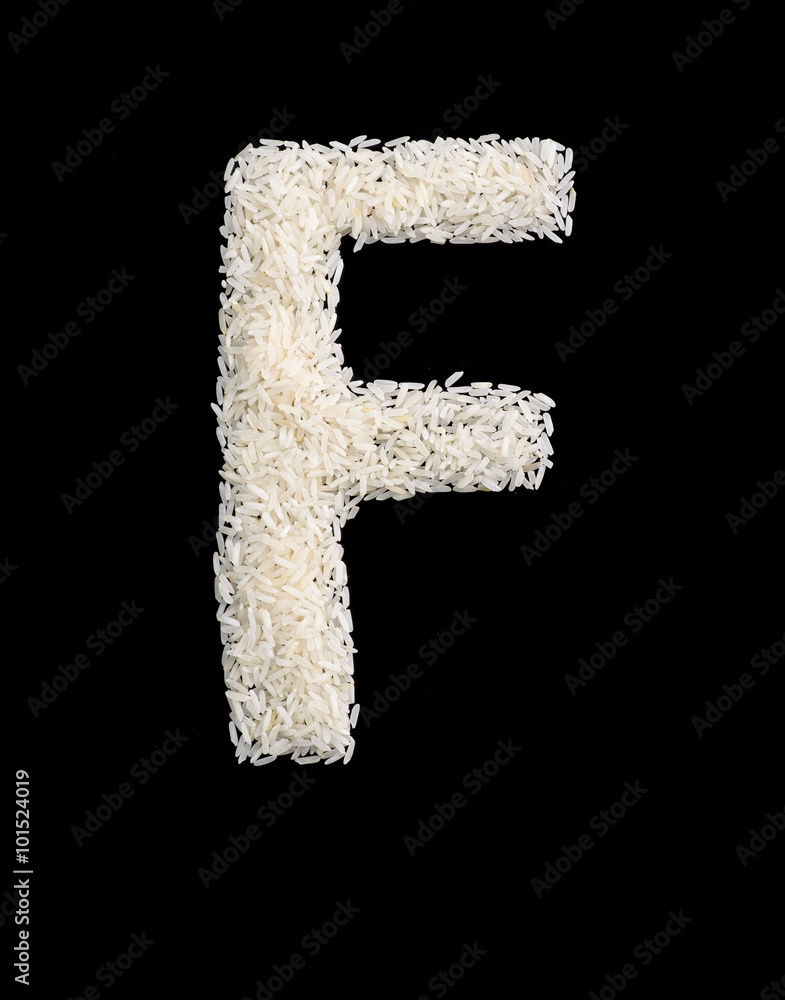 White rice grain alphabet letter f White rice grain alphabet letter f