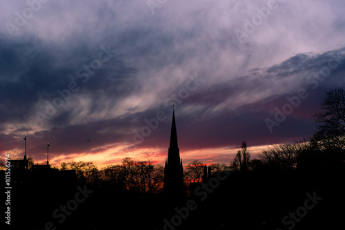 St. Mary Abbot's Church, Kensington. A silhouette of a church spire in central London, against an impressive sunset 