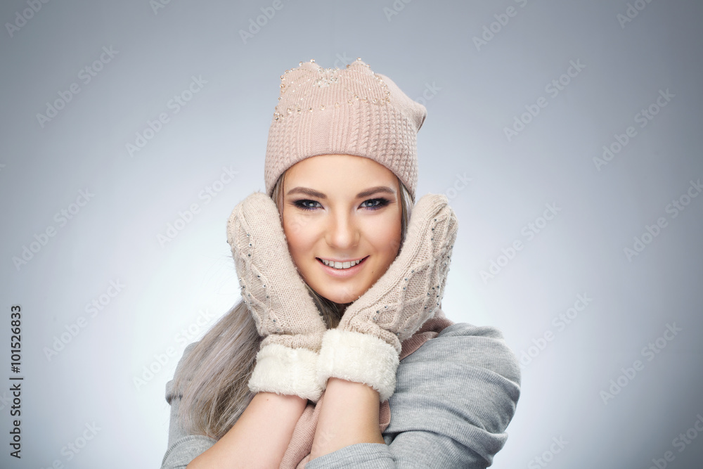 beautiful sexy girl in a sweater on a white background in studio beautiful sexy girl in a sweater on a white background in studio