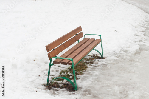 bench on melted snow