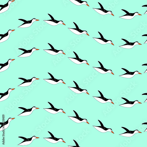 Penguin seamless pattern. The turquoise color. Penguins diving 