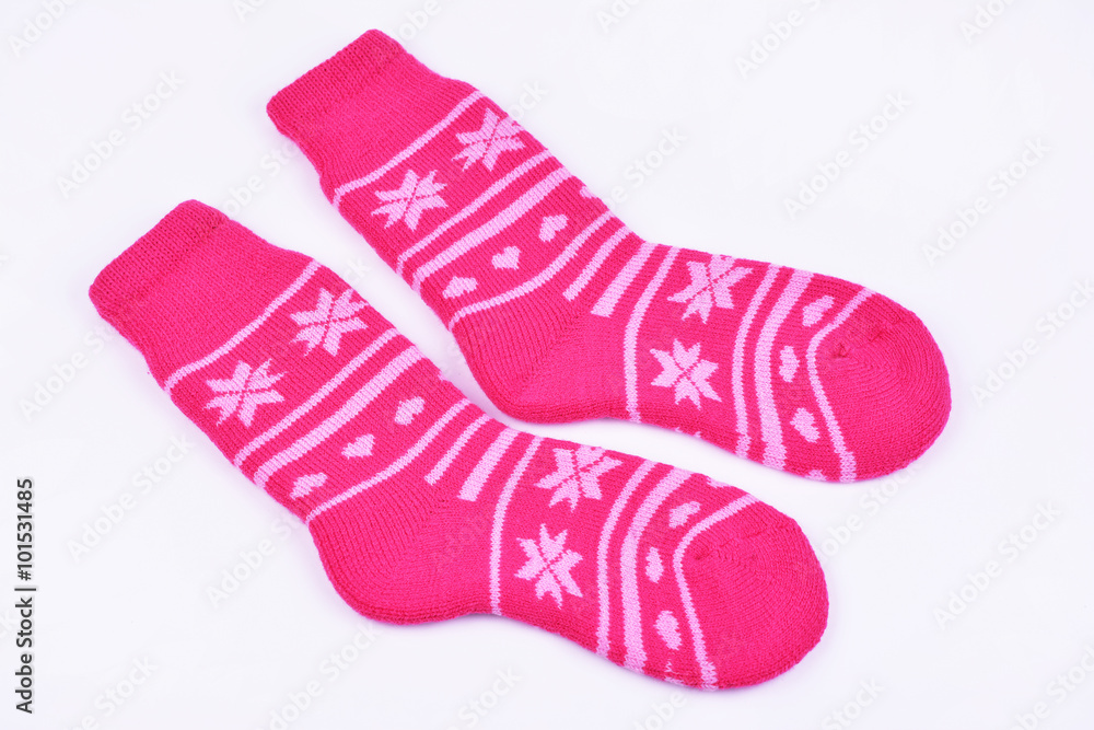 Wool knitted socks on white background Wool knitted socks on white background