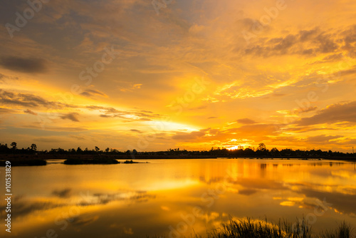 Sunset with Golden light over the lake