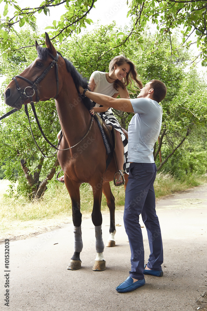 Happy family man woman couple smile park horse Happy family man woman couple smile park horse