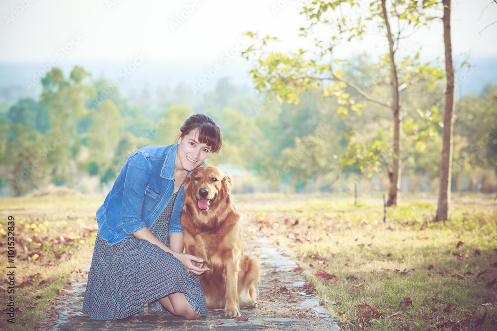 Fototapeta Golden retriever dog and Beautiful woman