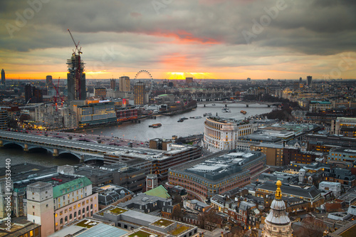 Panoramic view City of London at sunset. River Thames and London bridge © IRStone