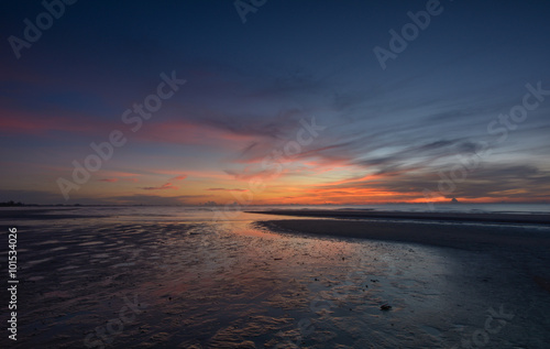 sunset on the beach © aee_werawan