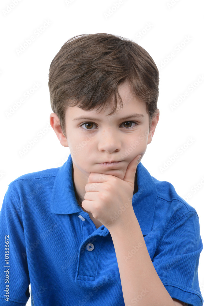 Serious boy expression isolated on white background Serious boy expression isolated on white background