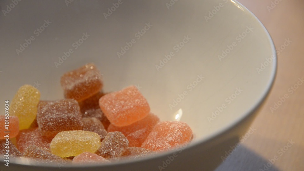 Eating delicious colorful candy Eating delicious colorful candy