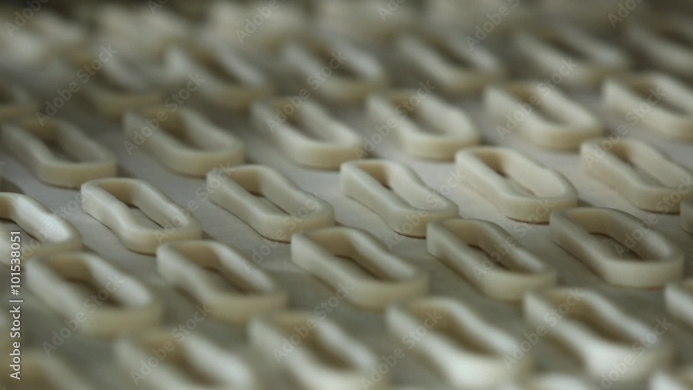 Bagels on the conveyor belt closeup Bagels on the conveyor belt closeup