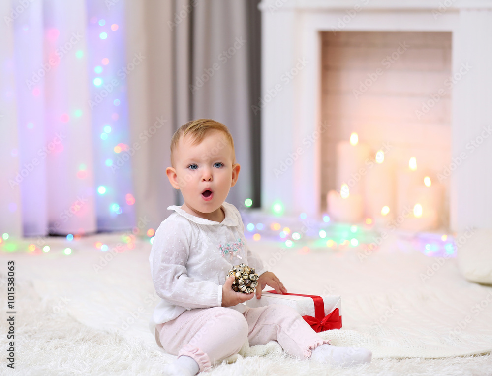 Funny baby girl in Christmas living room Funny baby girl in Christmas living room