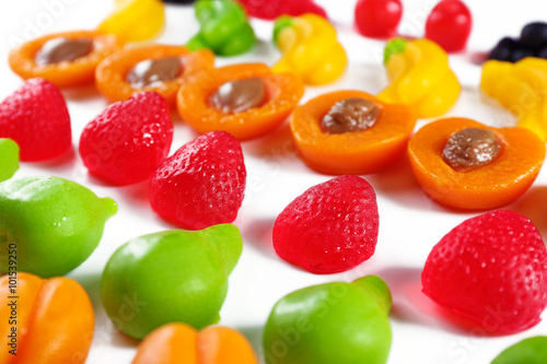 Set of lined colourful fruit jelly sweets, close-up