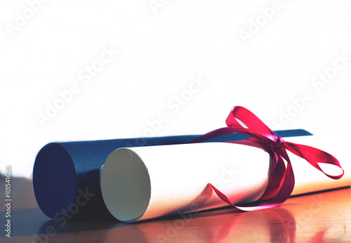 University diploma with bow