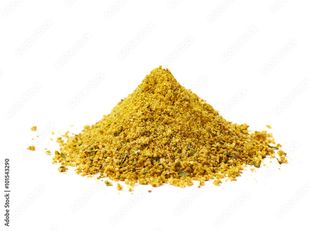 Pile of yellow curry seasoning isolated