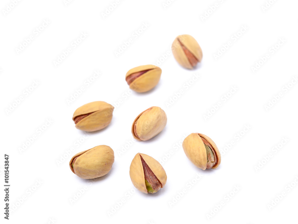 Pile of fresh pistachios isolated on white background Pile of fresh pistachios isolated on white background