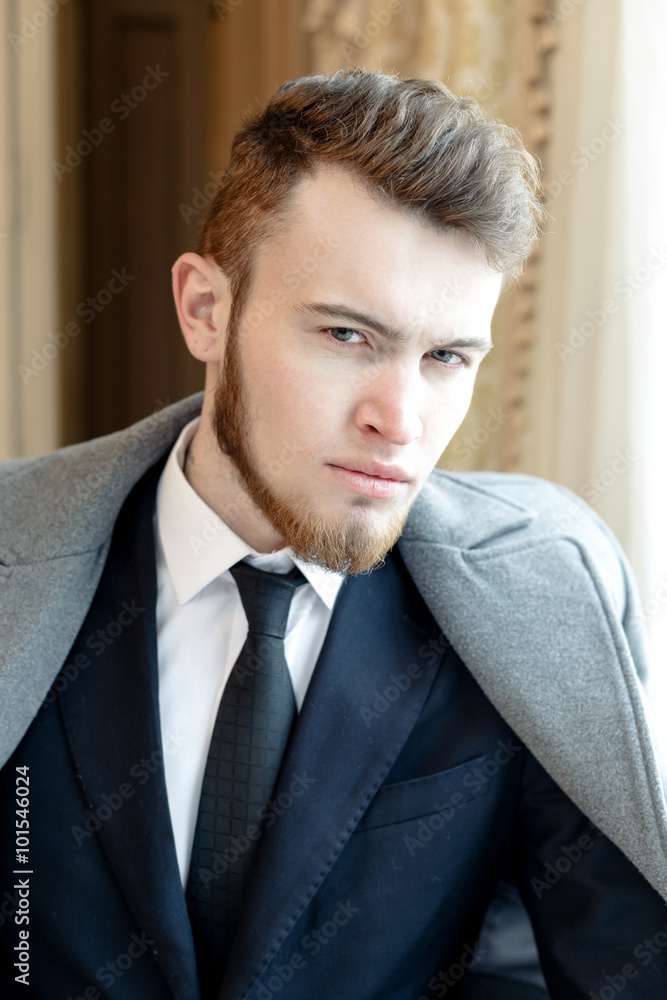 Close up portrait picture of a handsome young business man Close up portrait picture of a handsome young business man